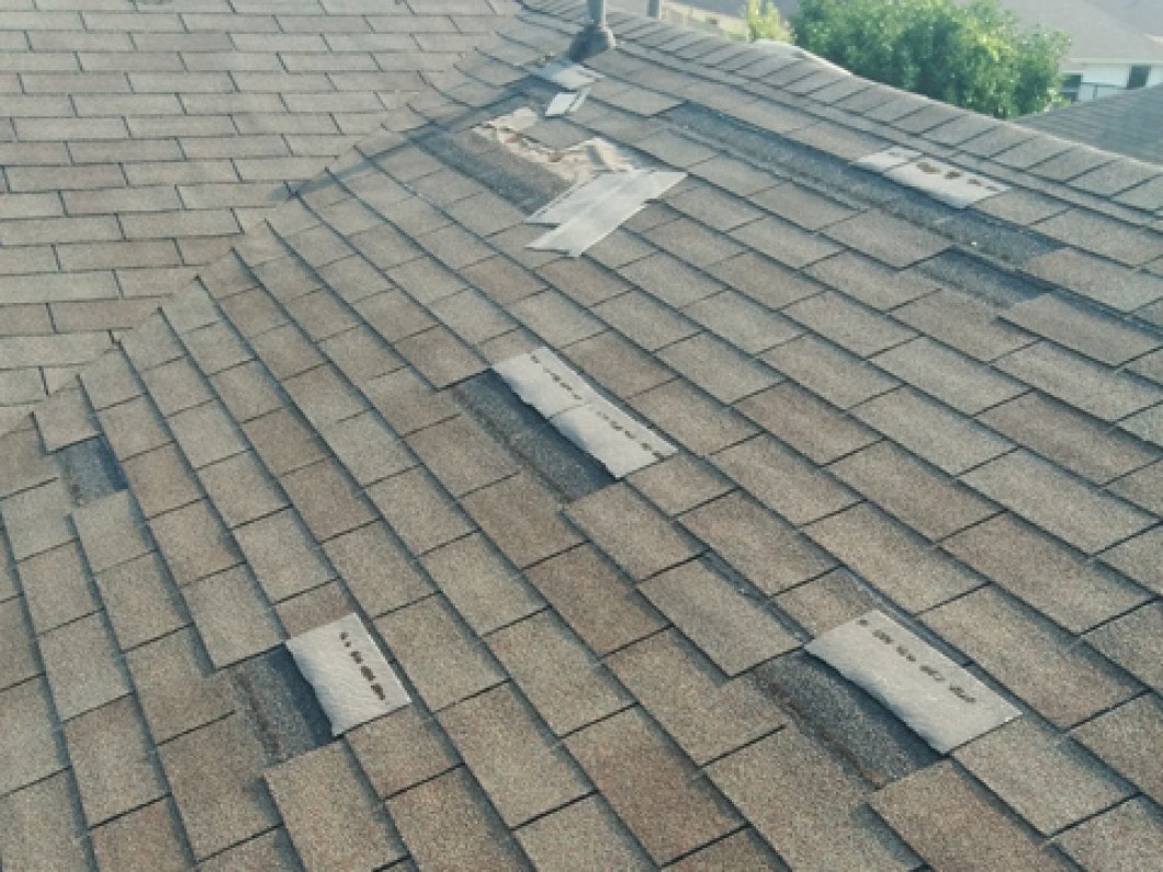 wind-damaged-shingles-min